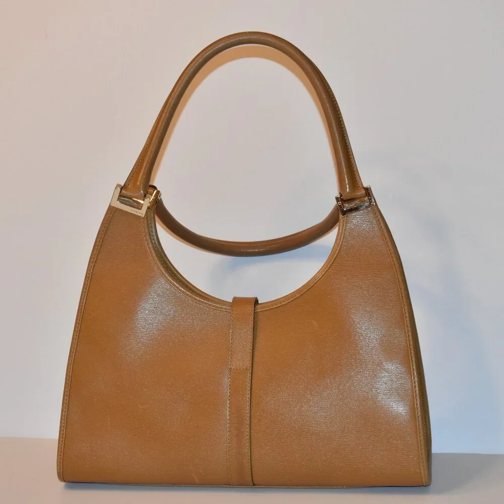 Vintage Gucci Bardo hobo bag in camel leather with the piston-lock closure